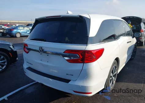 2020 Honda Odyssey Elite z USA, uszkodzony, nr VIN 5FNRL6H91LB044518